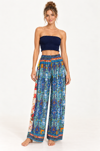 Tile Pants in blue tile print viscose rayon, front view styled with a navy top