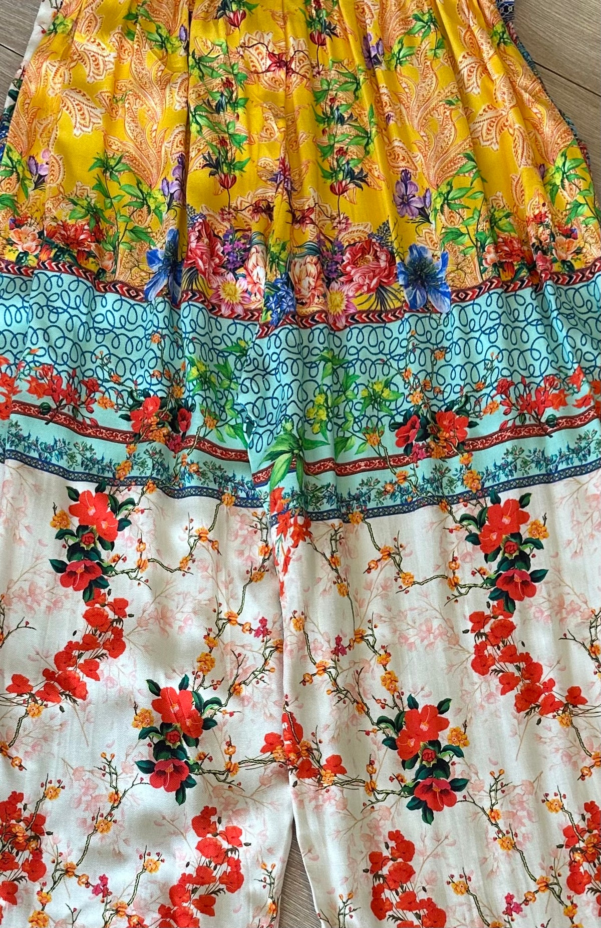 Tile Pants, close view of the coral blossom print at the back
