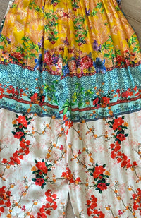 Tile Pants, close view of the coral blossom print at the back