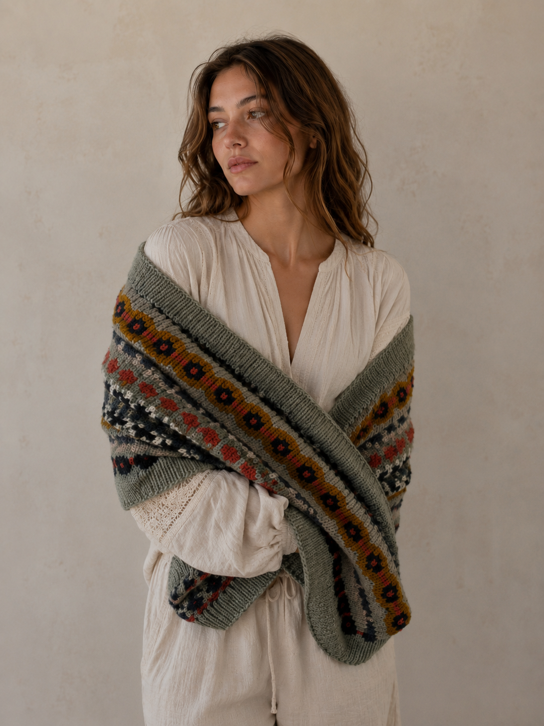 Nordic Grey Snood worn wrapped around the body as a cosy shawl, styled with a cream linen blouse