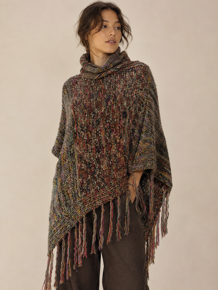 Rosa Turtleneck Poncho – handcrafted knit poncho with asymmetrical silhouette, long ribbed turtleneck and fringed tassels – Cienna Designs