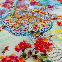 Jardin Palazzo Pants, close view of the mint floral and gold baroque print