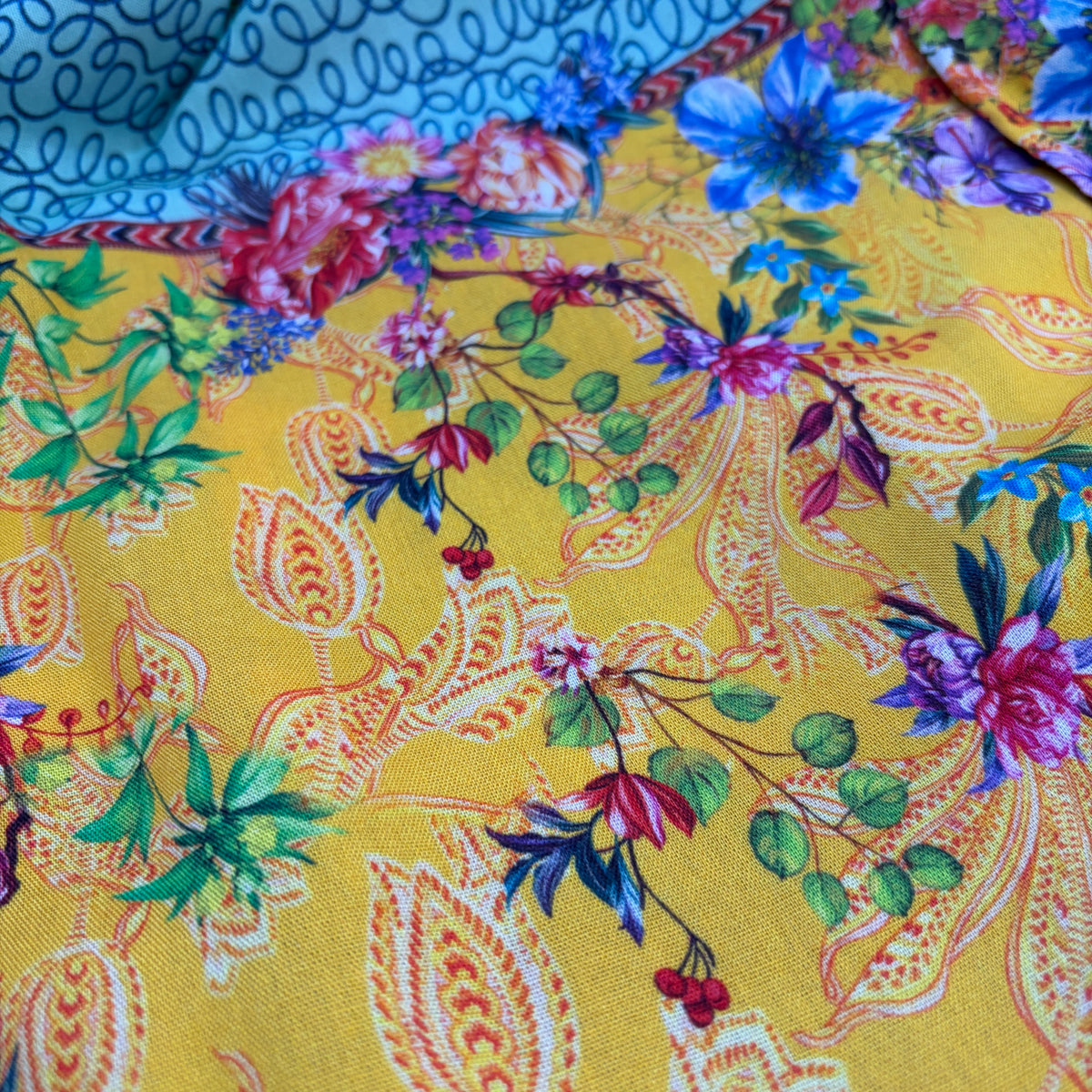 Tile Jumpsuit, close view of the paisley print