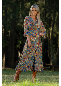 Aurora Long Sleeve Wrap Dress jewel-toned medallion print styled for evening in navy and gold — Cienna Designs