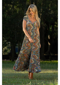 Aurora Rosa Dress jewel-toned medallion print, styled for a special occasion in navy and gold — Cienna Designs