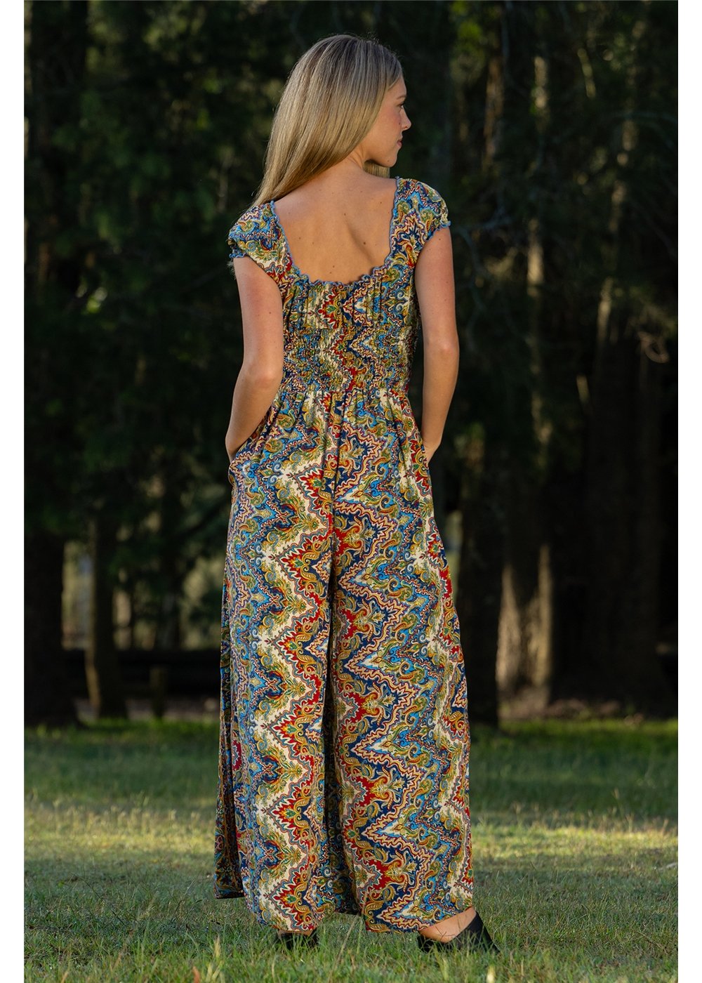 Aurora Rosa Jumpsuit in navy cobalt and gold medallion print, flowing silhouette in silk-polyester — Cienna Designs