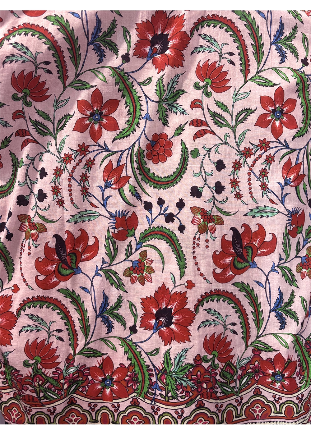 Ada Cape in pink floral silk viscose, close view of the floral fabric and decorative border