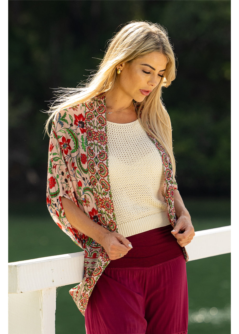 Ada Cape in pink floral silk viscose, second front view showing the collar and fluid drape