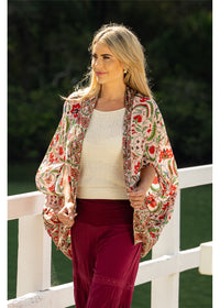 Ada Cape in pink floral silk viscose, front view worn open with split sleeves