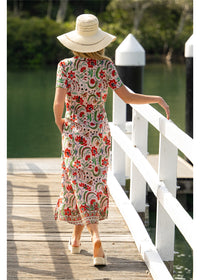 Ada Dress in pink floral cotton, back view showing the short sleeves and ankle-length skirt