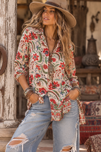 Ada Shirt in pink floral silk viscose, courtyard front view showing the shirt collar and rolled sleeves