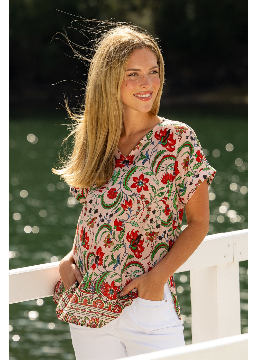 Ada Cuff Sleeve V Neck Top in pink floral cotton, front view showing the V neckline and short cuffed sleeves