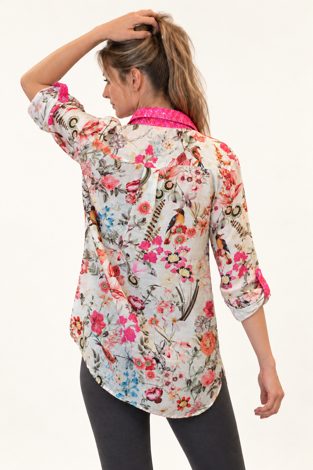 Birdsong Shirt in ivory bird-and-floral silk viscose, back view with rolled tab sleeves and a curved shirttail hem.