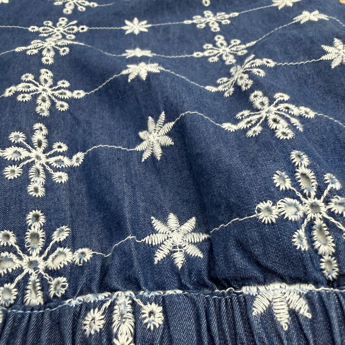 CJ-08 Floral Embroidered Jeans in indigo cotton denim, close-up of cream embroidery and waistband stitching