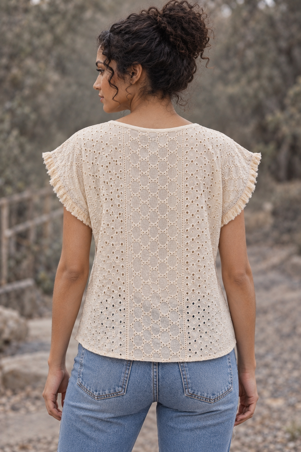 CJ-117 Top in natural cream showing the round back neckline and broderie panels, back view