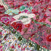CJ-167 Floral Skirt - Pink, detail of aqua and magenta floral appliqué, cream lace and green patterned borders