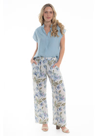 Cream Haven Hemi Pant in blue floral print cotton, front view showing the side pockets
