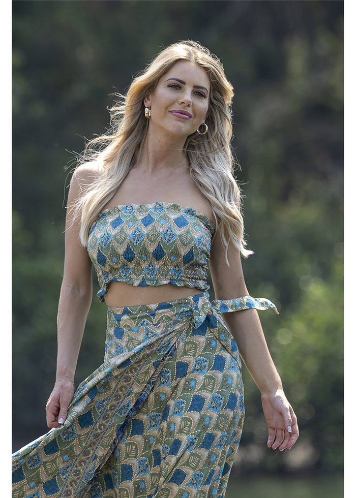 Dalah Bandeau in blue and green printed silk blend, front view showing the strapless shape and frill edges