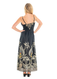 Malie Mood Dress in black cotton, side view showing the flowing maxi hem
