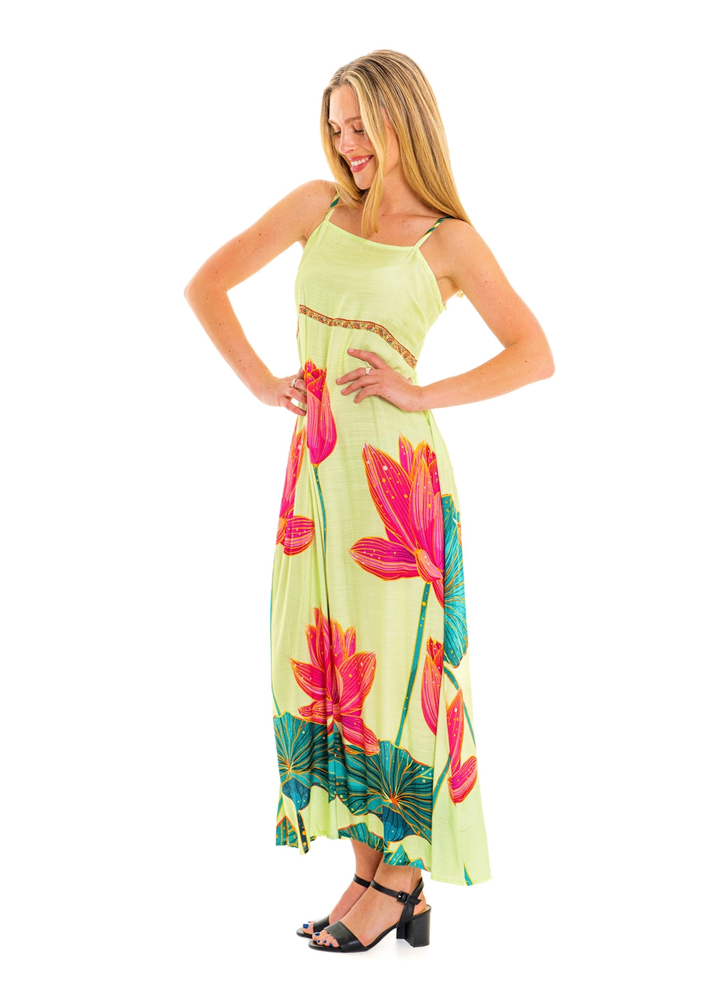 Lime Pink Lotus Dress in viscose linen, side view showing the flowing maxi skirt