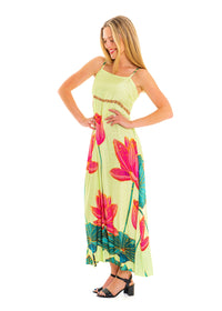 Lime Pink Lotus Dress in viscose linen, side view showing the flowing maxi skirt