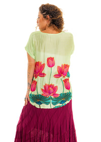 Lime Pink Lotus V-Neck Top in silk viscose, back view showing the longer hem and lotus print