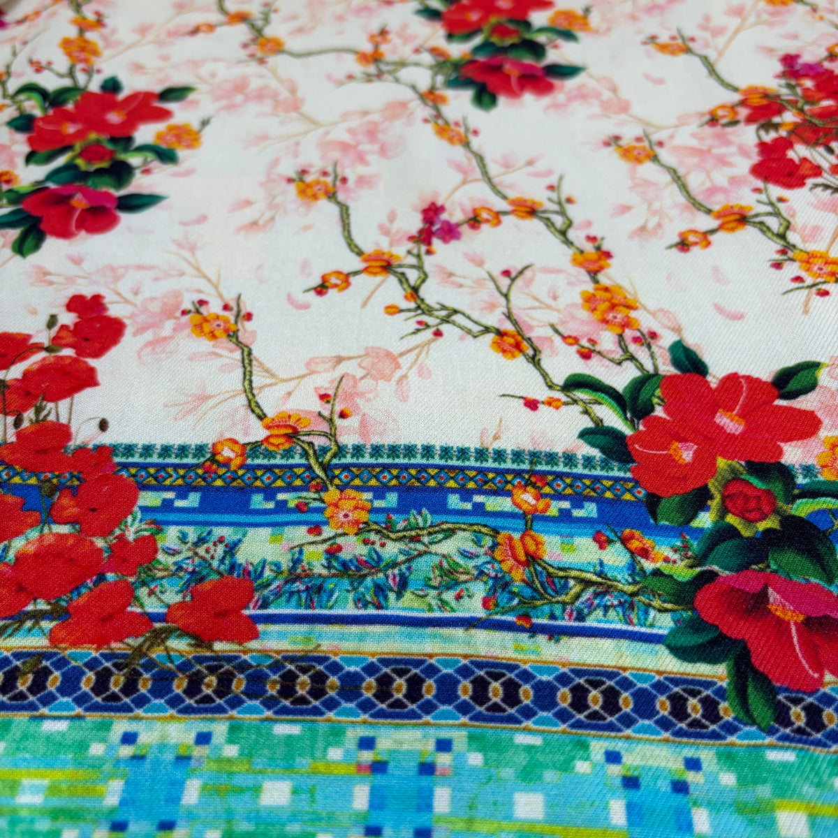 Tile Long Pants, close view of the coral blossom print