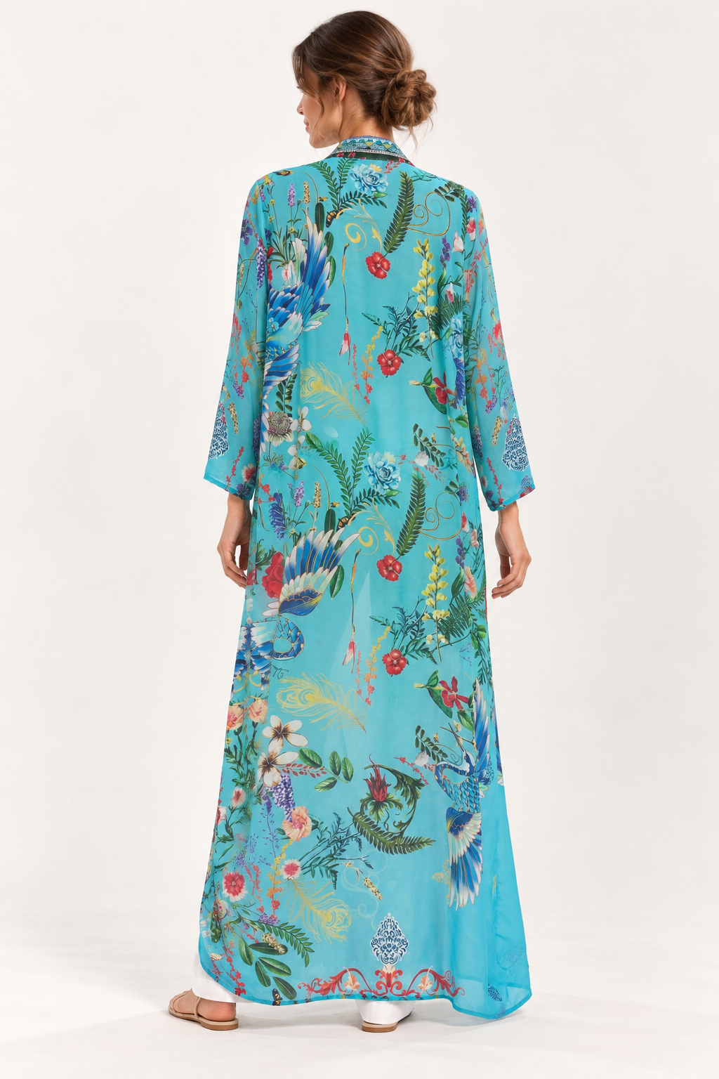 Turquoise Reverie Duster in turquoise with birds and botanical print, back view showing its full length