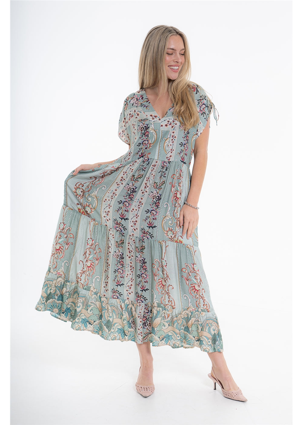 Vintage Blossom Bluebell Dress in blue-grey floral viscose linen, front view showing the tiered skirt held out