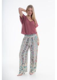 Vintage Blossom Juno Pant in blue-grey floral viscose linen, second front view showing the full-length legs