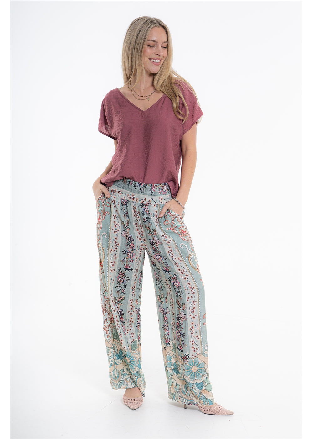 Vintage Blossom Juno Pant in blue-grey floral viscose linen, front view showing the smocked waistband and side pockets