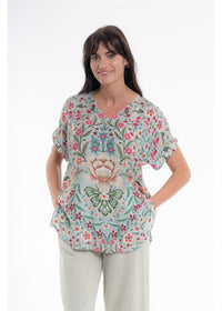 Vintage Blossom V-Neck Top in blue-grey floral viscose linen, front view showing the V neckline and cuffed sleeves