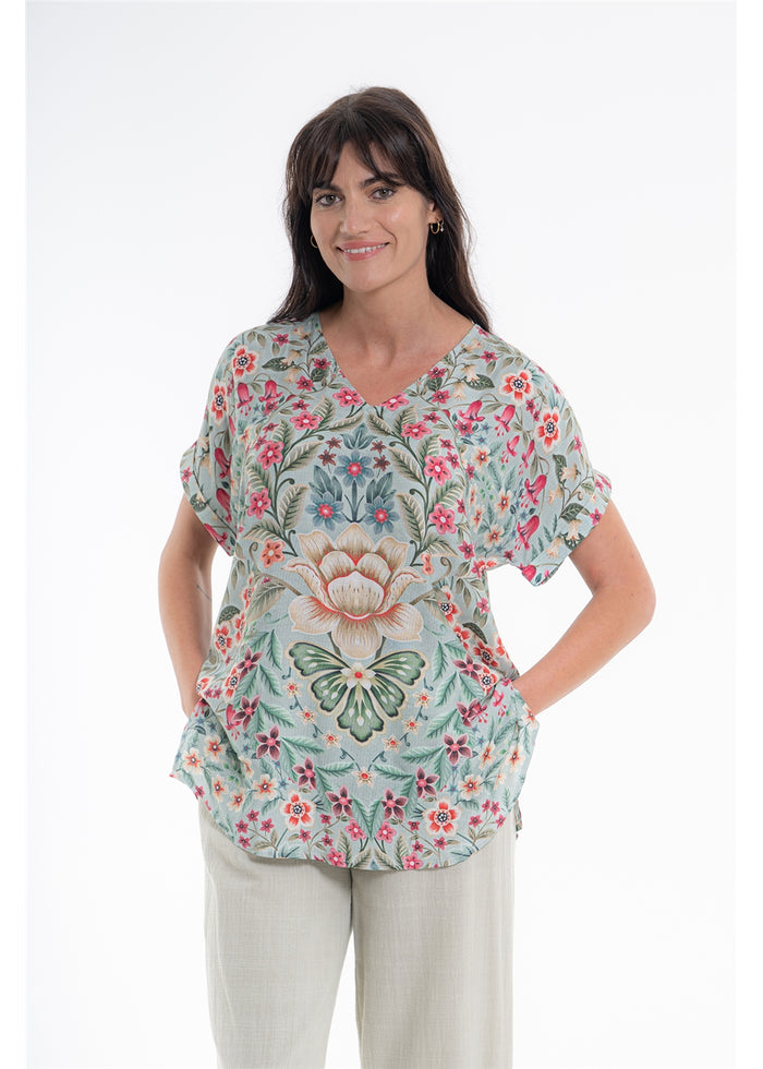 Vintage Blossom V-Neck Top in blue-grey floral viscose linen, front view showing the V neckline and cuffed sleeves
