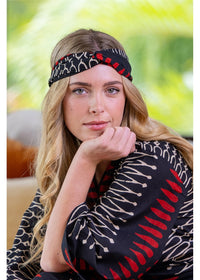 Yindi Cotton Headband in black, red and cream geometric cotton, front view worn with the matching Yindi Tie Top