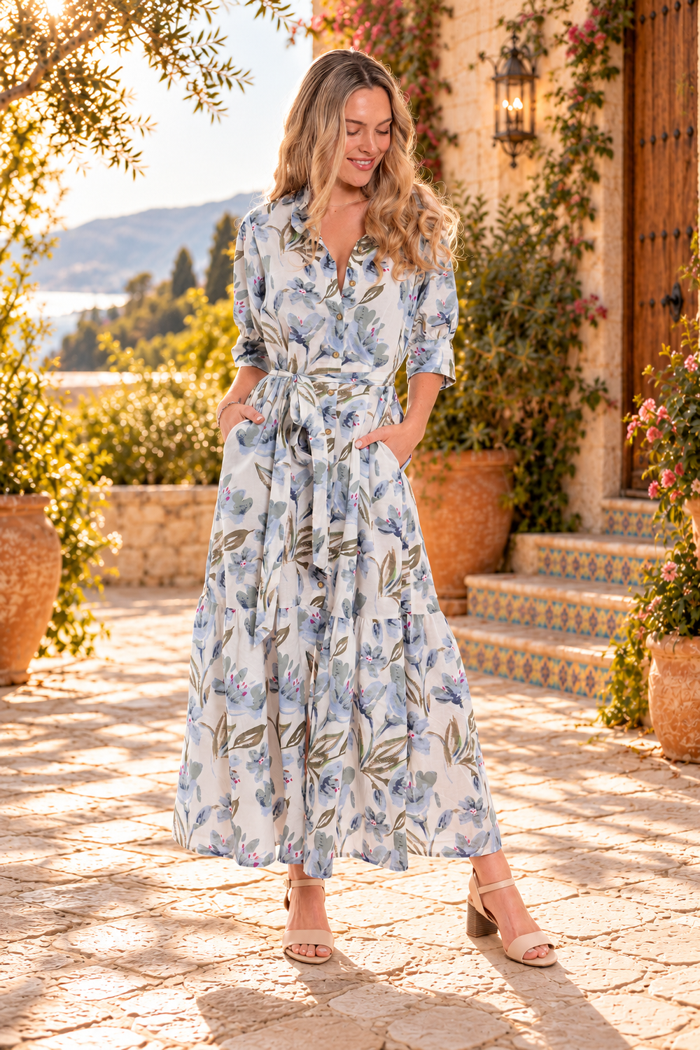 Haven Dai Dress, full-length portrait in the sunlit courtyard