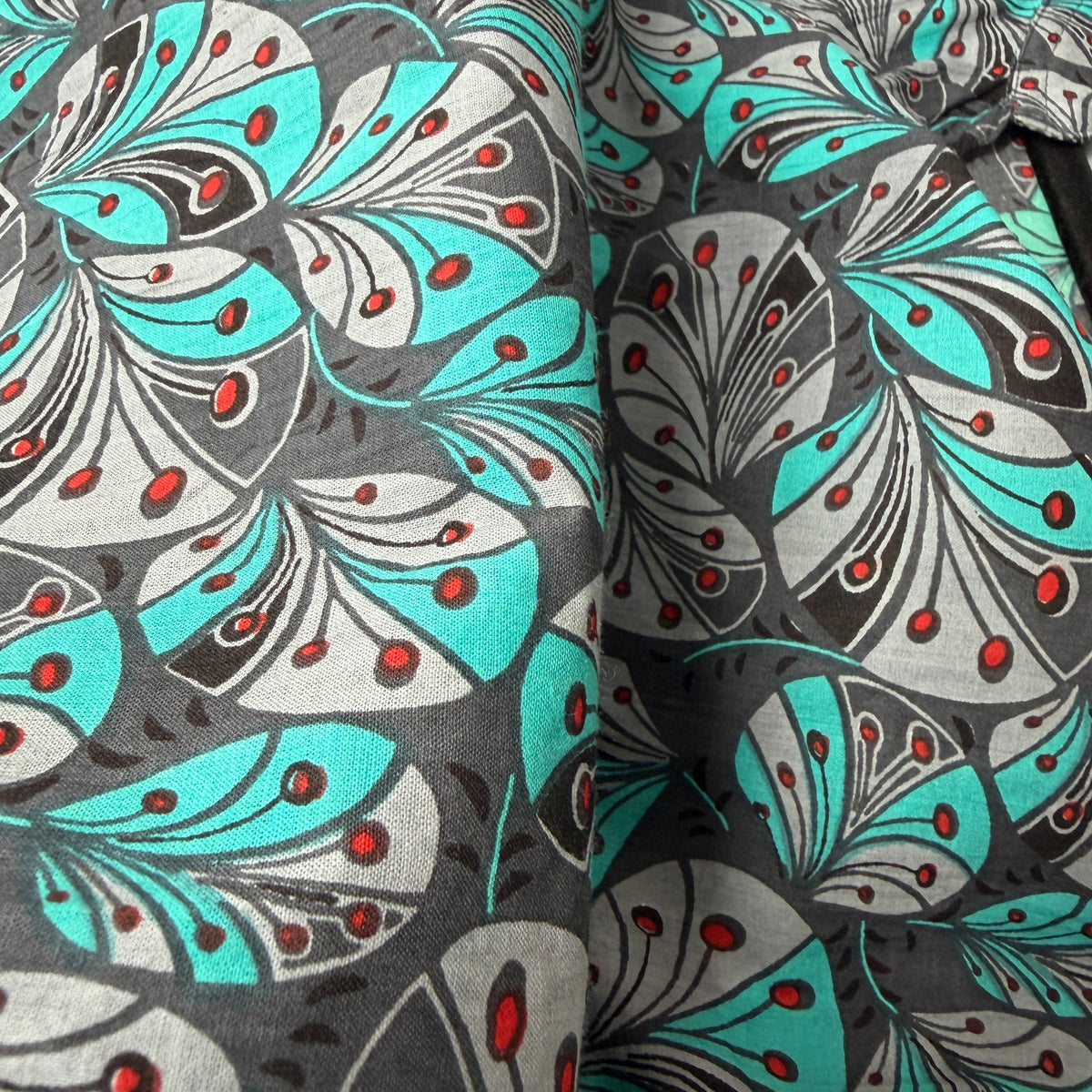 Cindy collection fabric swatch for Mai top showing soft white botanical teal and sage green floral print - Cienna Designs