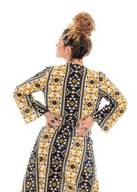 Coyote geometric print crossover top back view, high contrast navy gold and cream aztec-inspired geometric print - Cienna Designs