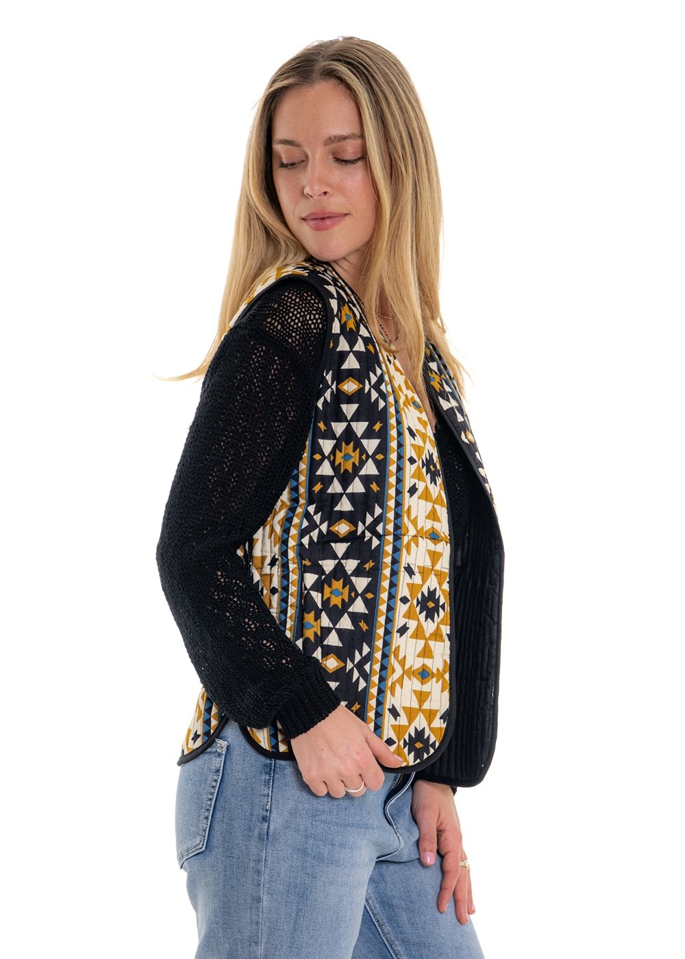 Coyote geometric print quilted vest side view with contrast binding detail, navy and gold mustard geometric motifs - Cienna Designs