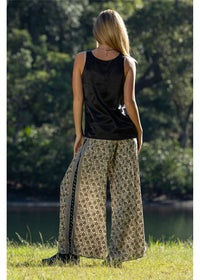 Izzy Elle Pants in detailed gold floral block print on charcoal, fluid wide-leg silhouette in silk-polyester — Cienna Designs