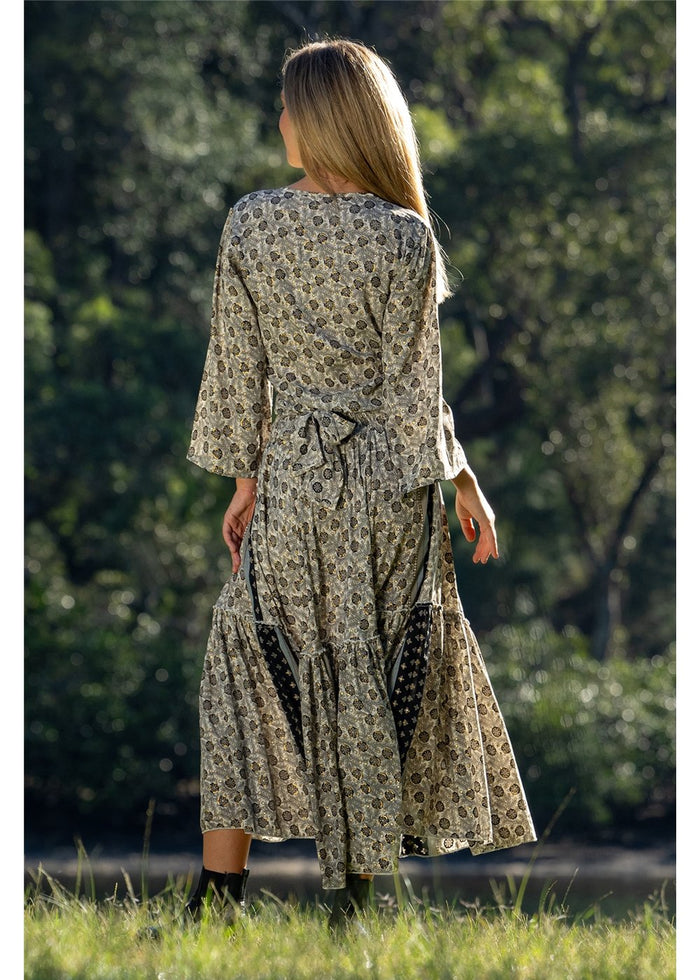 Izzy Frill Maxi Skirt in detailed gold floral block print on charcoal, flowing frill hem — Cienna Designs
