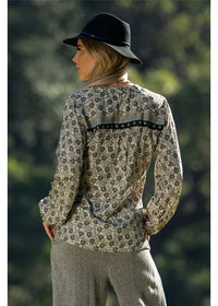 Izzy Long Sleeve Blouse in detailed gold floral block print on charcoal, flowing silk-polyester — Cienna Designs
