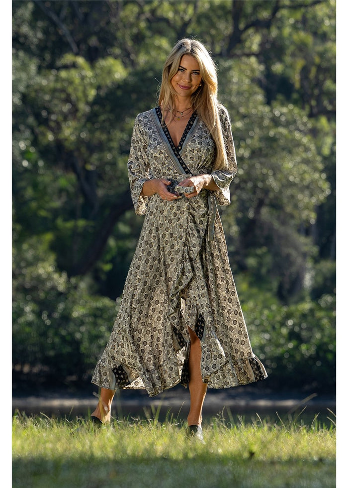 Izzy Long Sleeve Wrap Dress in detailed gold floral block print on charcoal, flowing silk-polyester — Cienna Designs