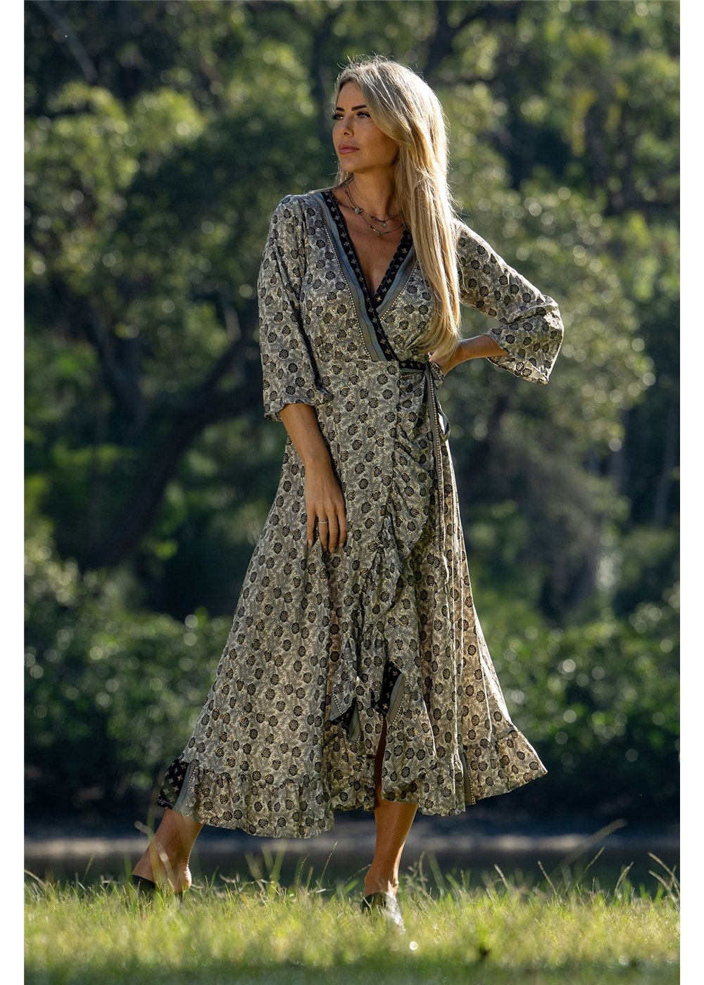 Izzy Long Sleeve Wrap Dress gold floral block print on charcoal, back view in silk-polyester — Cienna Designs