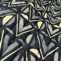 Katie geometric print quilted vest close-up detail in tonal grey and charcoal cotton - Cienna Designs