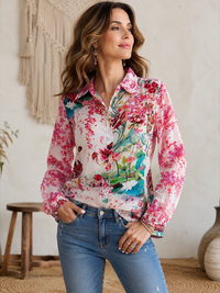Lotus Love shirt in semi-sheer silk-viscose blend with bold floral print in romantic pink tones, long relaxed fit with roll-tab sleeves and curved high-low hem - Cienna Designs