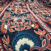 Close-up detail of Midnight Folk blouse embroidery on deep navy folk floral rayon with handcrafted artisan stitching - Cienna Designs