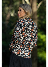 Myee Collared Blouse in black terracotta and ivory tribal print, tie-front collar detail silk-polyester — Cienna Designs