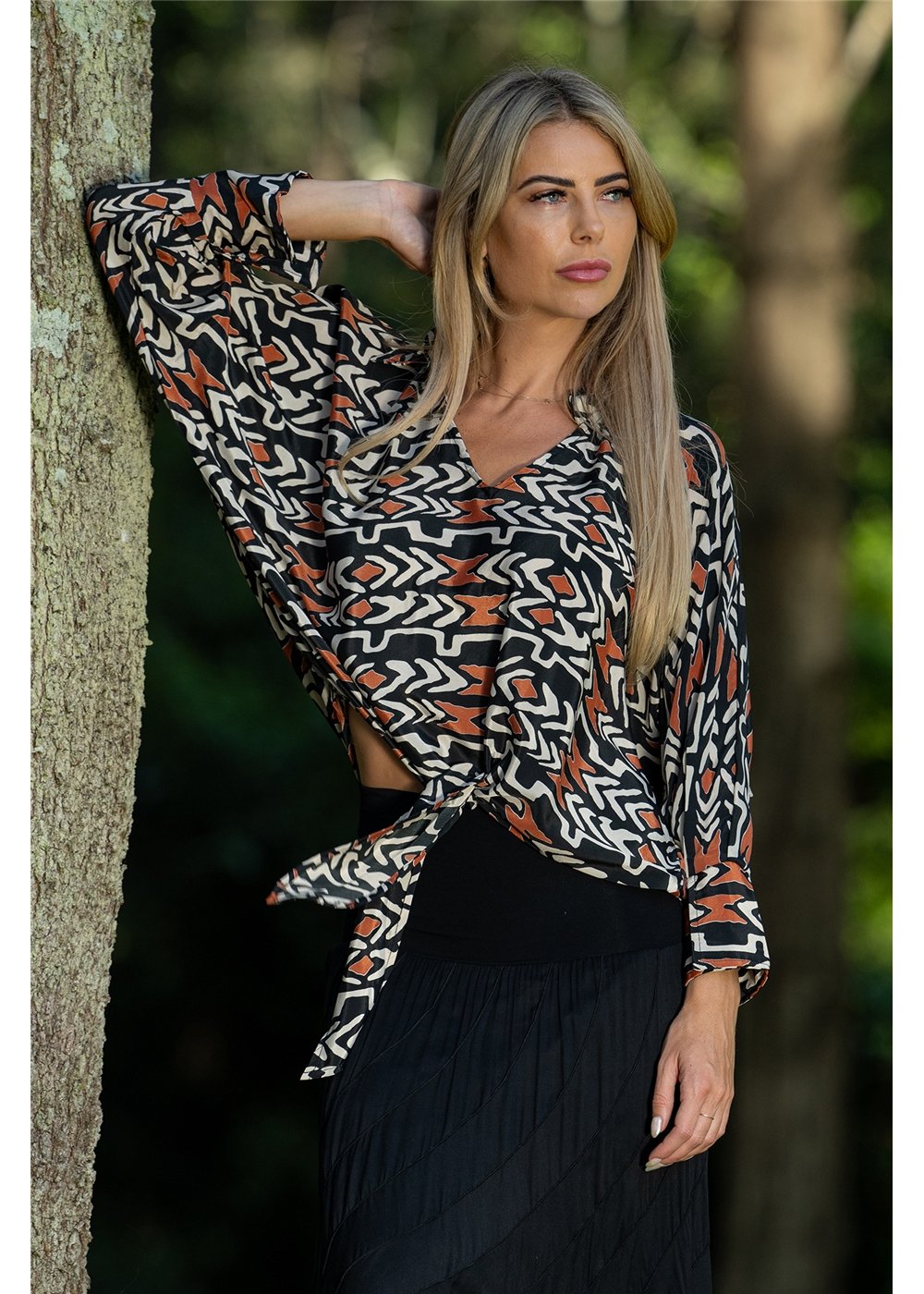 Myee Collared Blouse in silk-polyester tribal print, side view black terracotta and ivory — Cienna Designs