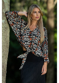 Myee Collared Blouse in silk-polyester tribal print, side view black terracotta and ivory — Cienna Designs