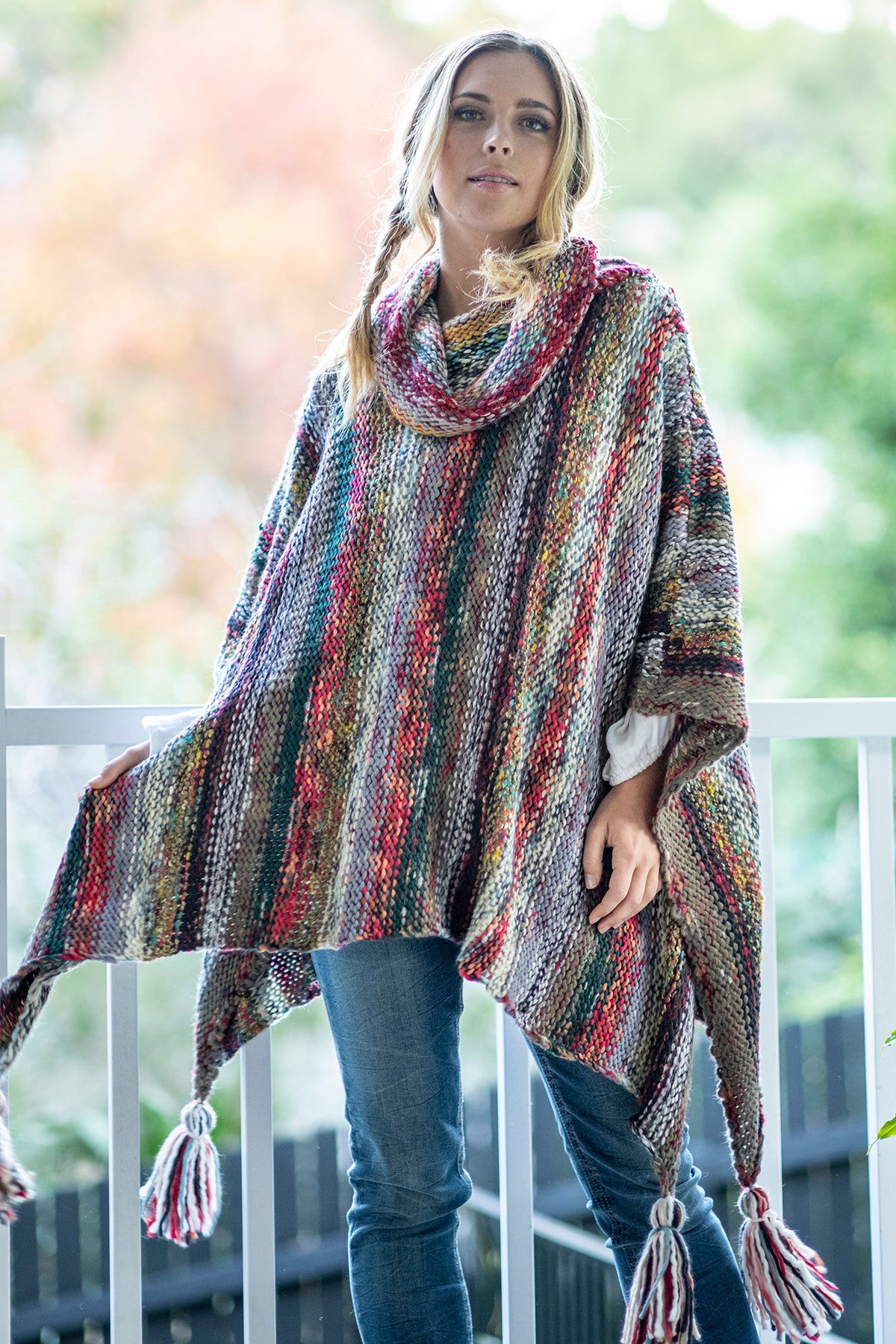 Nia Woodland Turtleneck Poncho in red and green woodland tones knit, relaxed poncho silhouette with turtleneck collar - Cienna Designs
